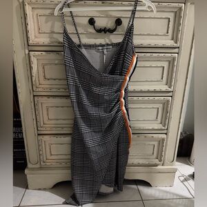 Almost Famous Asymmetrical Black and White Dress with Orange Stripe